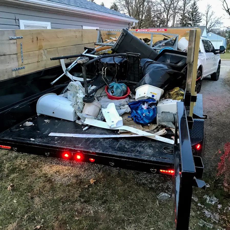 Roll-off dumpster delivered to a residential driveway in Terrytown